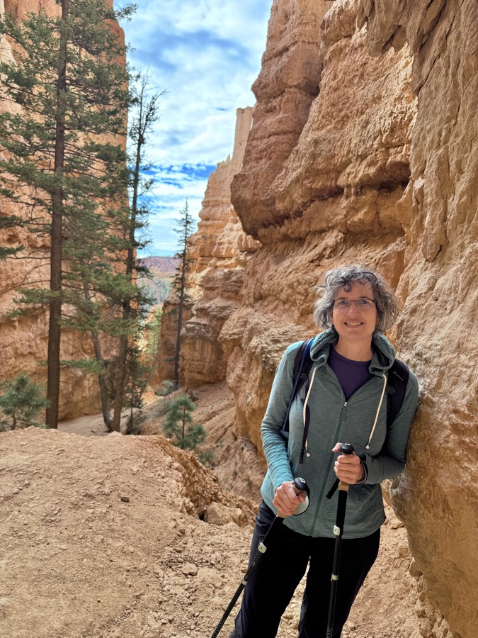 Joslyn Aubin hiking in a red rock canyon